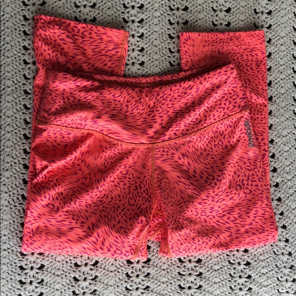 Women’s Reebok orange animal print capris size S